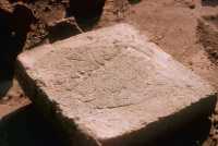 128 Uruk, brique marquée d'un sceau