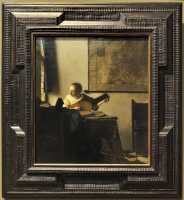 32 Johannes Vermeer - Jeune femme jouant du luth (1660±)